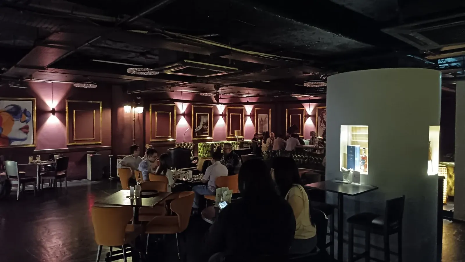 Guests seated in LandOn’s warmly lit lounge
